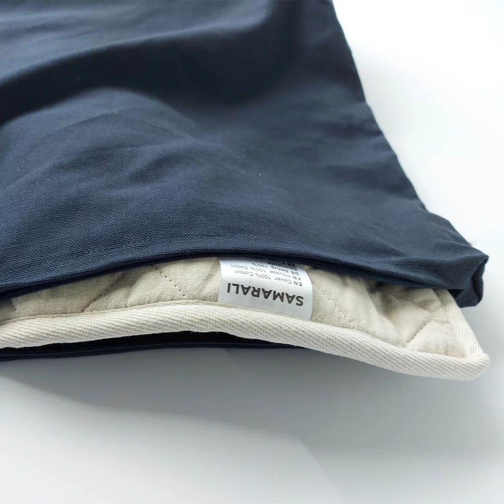 Bio Yogamatte aus Baumwolle in sanften Farben, ideal für Yoga-Übungen auf nachhaltige Weise.