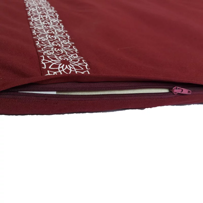 Zabuton Meditationsmatte aus Bio-Material, GOTS-zertifiziert, vegan, in sanften Farben auf einem hellen Hintergrund.