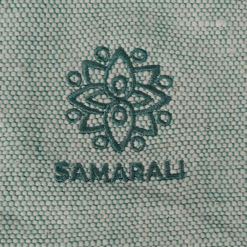 Yoga Decke aus handgewebter Bio Baumwolle in grün, nachhaltig und umweltfreundlich, ideal für Yoga und Meditation.