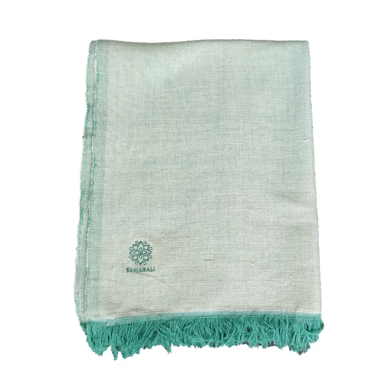 Yogadecke aus handgefertigter Bio-Baumwolle in grün, nachhaltig und umweltfreundlich, perfekt für Yoga und Entspannung.